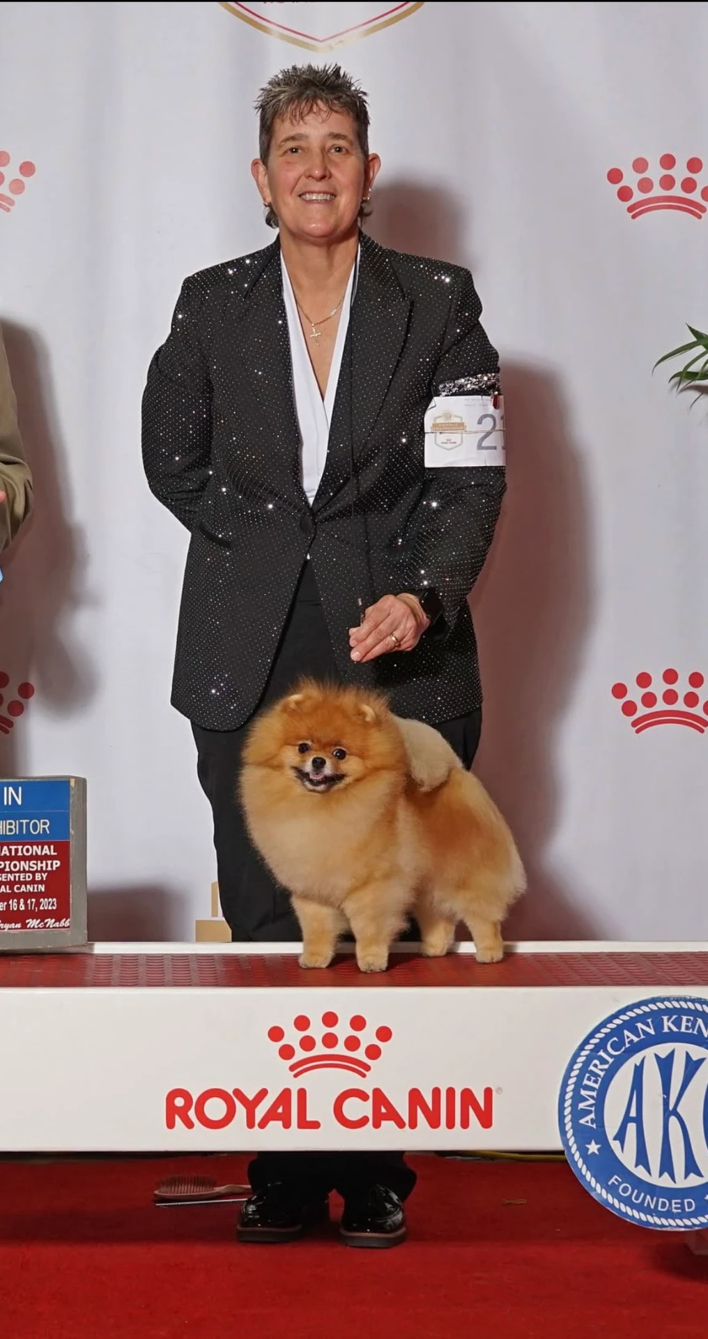 Sonya Ratliff with a champion Pomeranian at a dog show