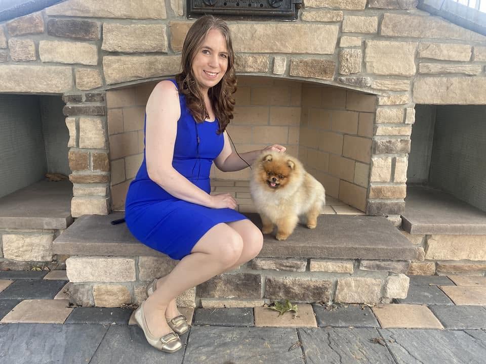 Elizabeth Heckert with a Pomeranian